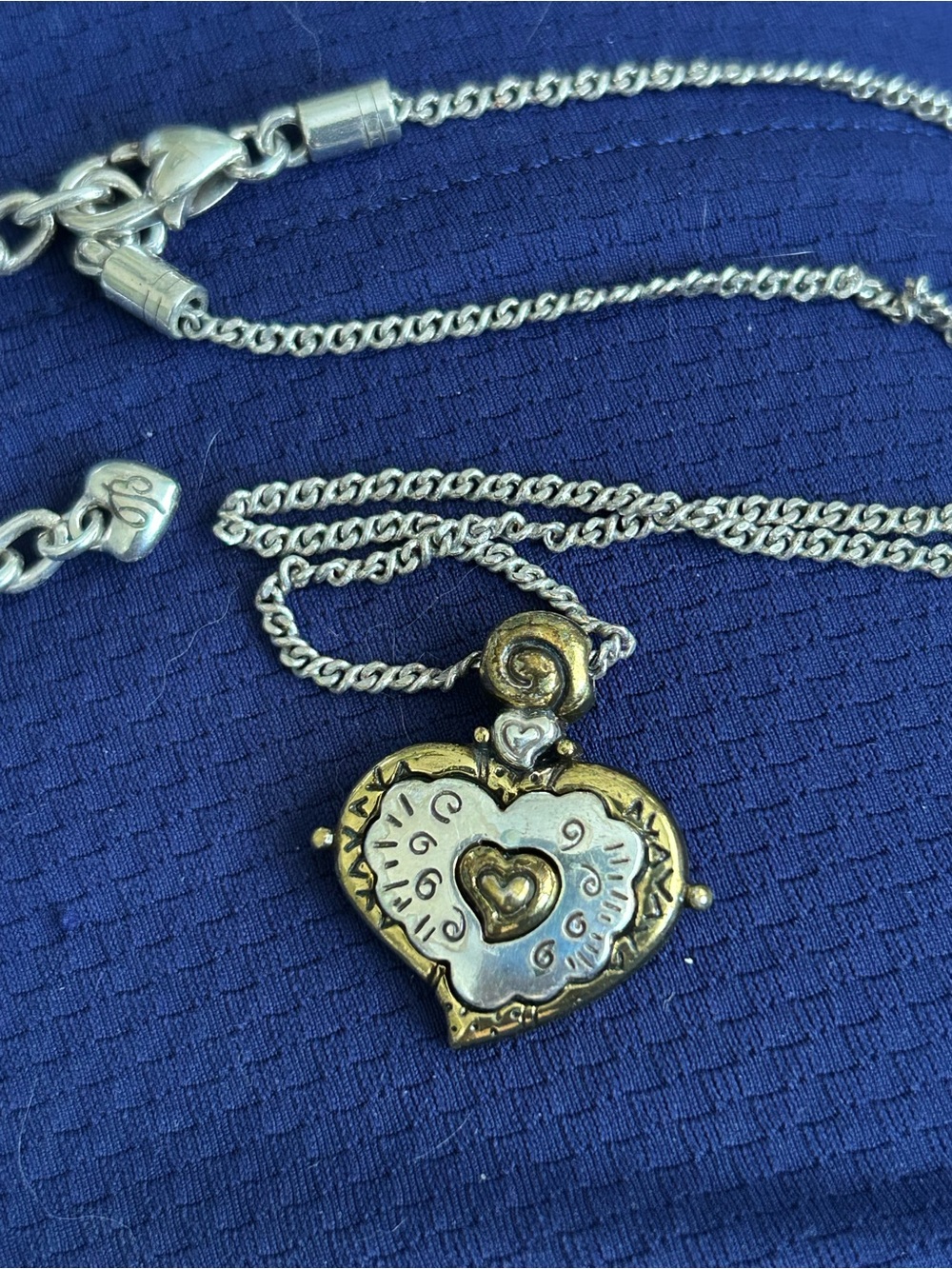Brighton Wild Heart reversible necklace featuring gold and silver plating